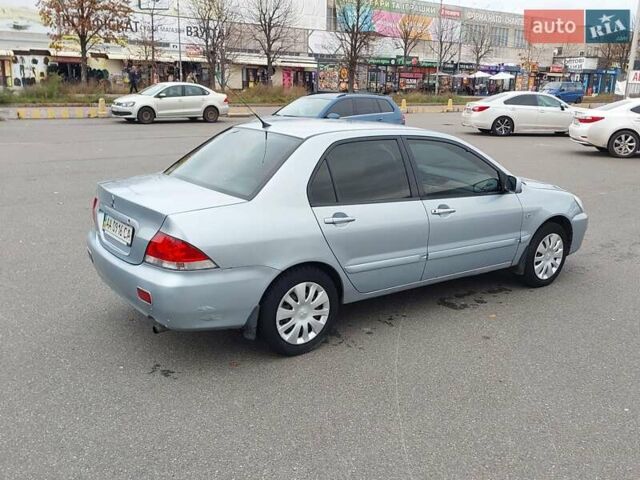 Мицубиси Лансер 2006 в Киеве на Automoto.ua Серый Мицубиси Лансер, объемом двигателя 1.6 л и пробегом 426 тыс. км за 3800 $, фото 7 на Automoto.ua