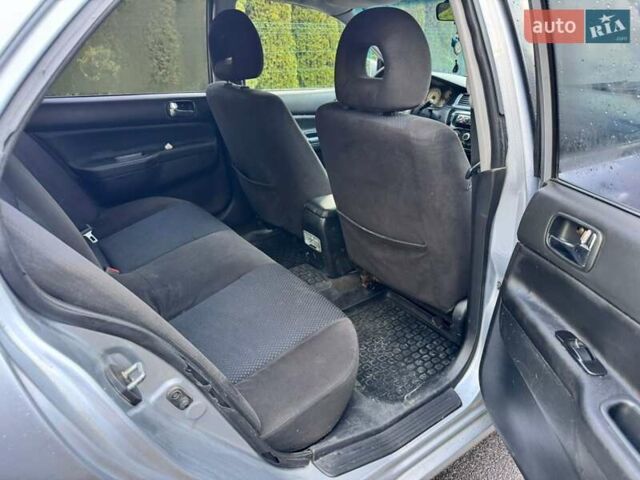 Сірий Міцубісі Lancer, об'ємом двигуна 1.58 л та пробігом 333 тис. км за 2999 $, фото 10 на Automoto.ua