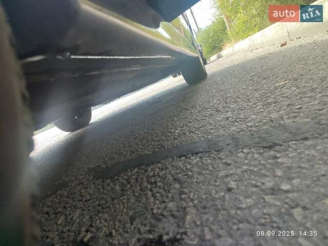 Сірий Міцубісі Lancer, об'ємом двигуна 1.6 л та пробігом 242 тис. км за 4900 $, фото 17 на Automoto.ua