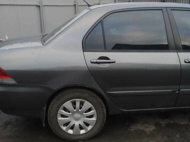Сірий Міцубісі Lancer, об'ємом двигуна 1.6 л та пробігом 202 тис. км за 3300 $, фото 2 на Automoto.ua