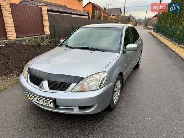 Сірий Міцубісі Lancer, об'ємом двигуна 1.58 л та пробігом 333 тис. км за 2750 $, фото 2 на Automoto.ua