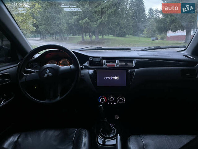 Серый Мицубиси Лансер, объемом двигателя 1.58 л и пробегом 240 тыс. км за 2650 $, фото 11 на Automoto.ua