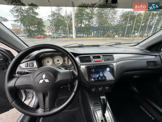 Серый Мицубиси Лансер, объемом двигателя 1.58 л и пробегом 183 тыс. км за 4800 $, фото 19 на Automoto.ua