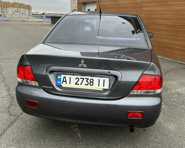Сірий Міцубісі Lancer, об'ємом двигуна 1.6 л та пробігом 260 тис. км за 4998 $, фото 22 на Automoto.ua