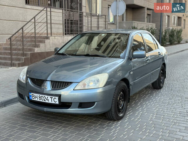 Сірий Міцубісі Lancer, об'ємом двигуна 1.6 л та пробігом 152 тис. км за 3800 $, фото 1 на Automoto.ua