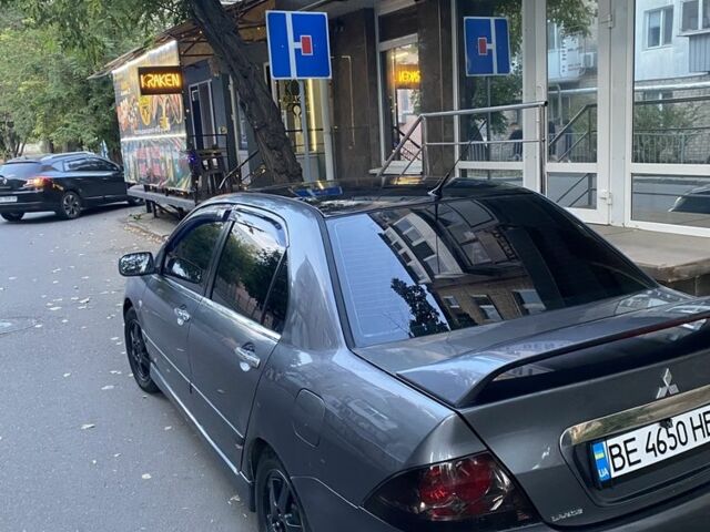 Сірий Міцубісі Lancer, об'ємом двигуна 1.6 л та пробігом 2 тис. км за 4750 $, фото 6 на Automoto.ua