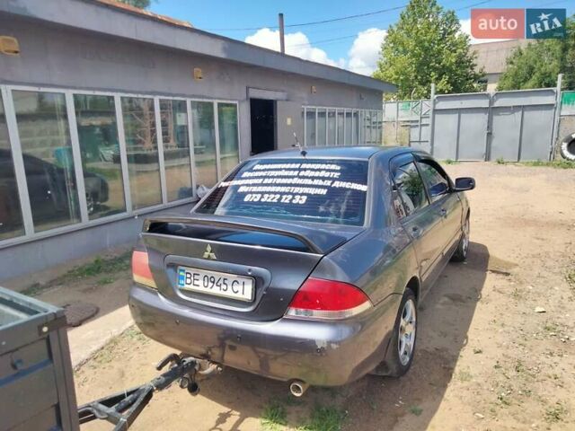 Сірий Міцубісі Lancer, об'ємом двигуна 1.6 л та пробігом 318 тис. км за 3500 $, фото 6 на Automoto.ua