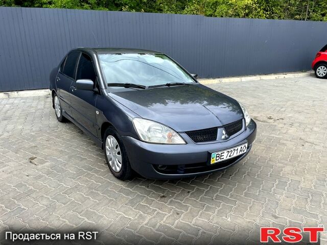 Сірий Міцубісі Lancer, об'ємом двигуна 1.6 л та пробігом 162 тис. км за 4650 $, фото 4 на Automoto.ua