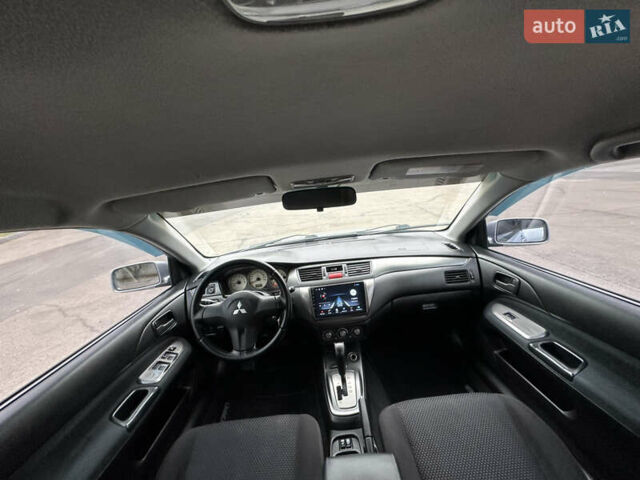 Серый Мицубиси Лансер, объемом двигателя 1.58 л и пробегом 183 тыс. км за 4800 $, фото 22 на Automoto.ua