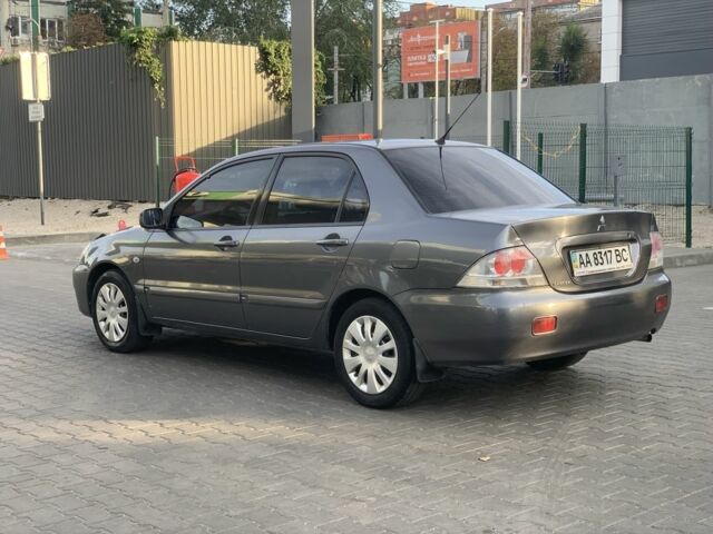 Сірий Міцубісі Lancer, об'ємом двигуна 1.6 л та пробігом 270 тис. км за 3800 $, фото 6 на Automoto.ua