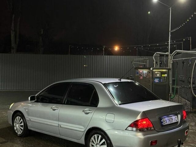 Серый Мицубиси Лансер, объемом двигателя 1.6 л и пробегом 330 тыс. км за 3200 $, фото 3 на Automoto.ua