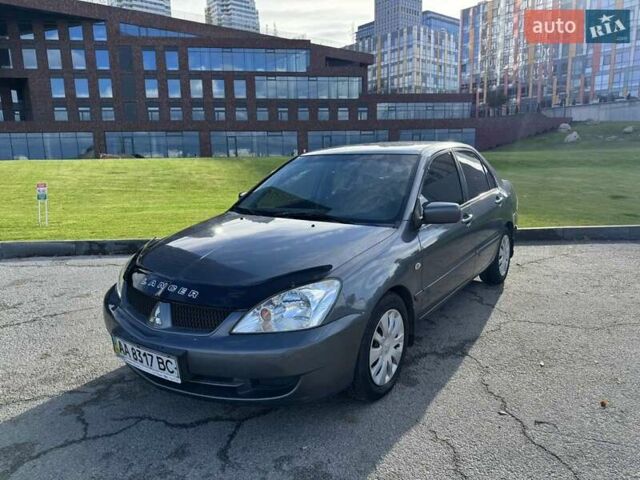 Сірий Міцубісі Lancer, об'ємом двигуна 1.58 л та пробігом 276 тис. км за 3650 $, фото 2 на Automoto.ua