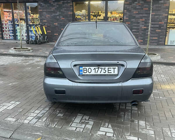Сірий Міцубісі Lancer, об'ємом двигуна 1.6 л та пробігом 244 тис. км за 2999 $, фото 6 на Automoto.ua