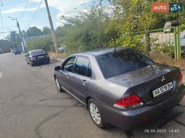 Сірий Міцубісі Lancer, об'ємом двигуна 1.6 л та пробігом 242 тис. км за 4900 $, фото 2 на Automoto.ua