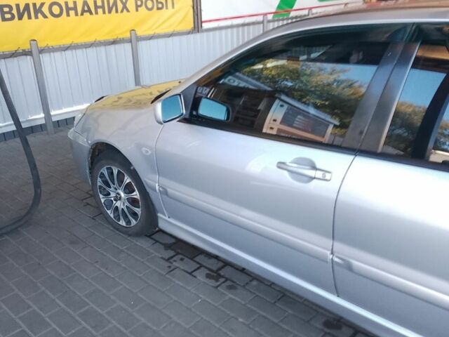 Сірий Міцубісі Lancer, об'ємом двигуна 1.6 л та пробігом 40 тис. км за 6000 $, фото 6 на Automoto.ua