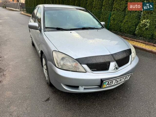 Сірий Міцубісі Lancer, об'ємом двигуна 1.58 л та пробігом 333 тис. км за 2999 $, фото 3 на Automoto.ua