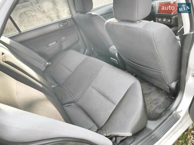 Серый Мицубиси Лансер, объемом двигателя 1.6 л и пробегом 234 тыс. км за 4300 $, фото 5 на Automoto.ua