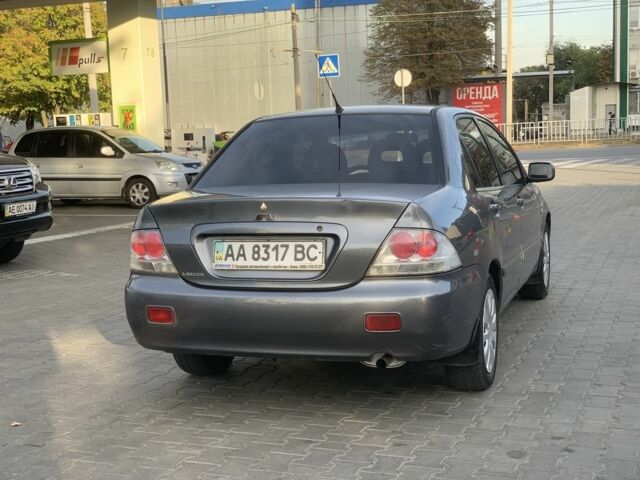 Сірий Міцубісі Lancer, об'ємом двигуна 1.6 л та пробігом 270 тис. км за 3800 $, фото 5 на Automoto.ua