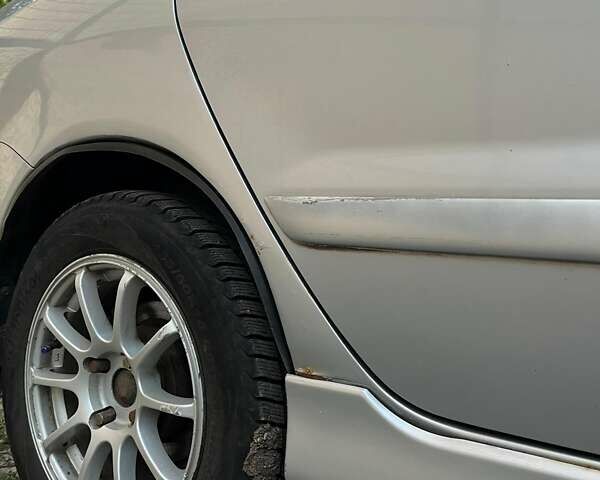 Сірий Міцубісі Lancer, об'ємом двигуна 1.6 л та пробігом 225 тис. км за 4200 $, фото 7 на Automoto.ua