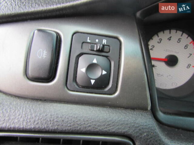 Серый Мицубиси Лансер, объемом двигателя 1.58 л и пробегом 300 тыс. км за 3600 $, фото 21 на Automoto.ua