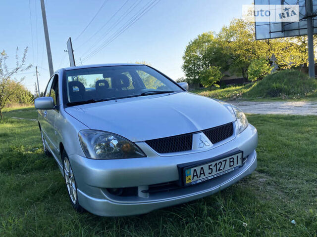 Сірий Міцубісі Lancer, об'ємом двигуна 2 л та пробігом 205 тис. км за 5500 $, фото 10 на Automoto.ua