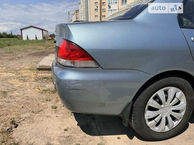 Сірий Міцубісі Lancer, об'ємом двигуна 1.6 л та пробігом 140 тис. км за 4999 $, фото 4 на Automoto.ua