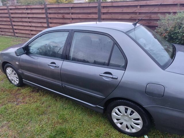 Сірий Міцубісі Lancer, об'ємом двигуна 1.6 л та пробігом 190 тис. км за 3500 $, фото 2 на Automoto.ua