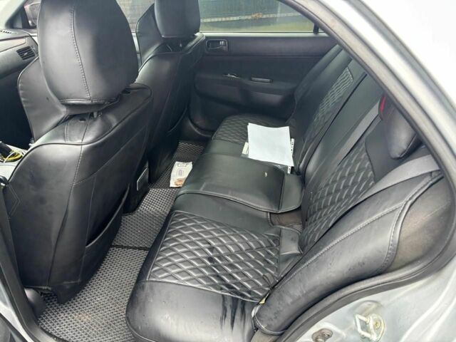 Серый Мицубиси Лансер, объемом двигателя 1.6 л и пробегом 260 тыс. км за 4999 $, фото 4 на Automoto.ua