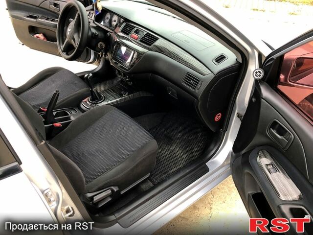 Серый Мицубиси Лансер, объемом двигателя 1.6 л и пробегом 0 тыс. км за 4000 $, фото 8 на Automoto.ua