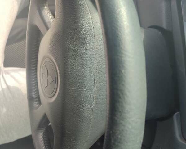 Сірий Міцубісі Lancer, об'ємом двигуна 1.6 л та пробігом 242 тис. км за 4900 $, фото 47 на Automoto.ua