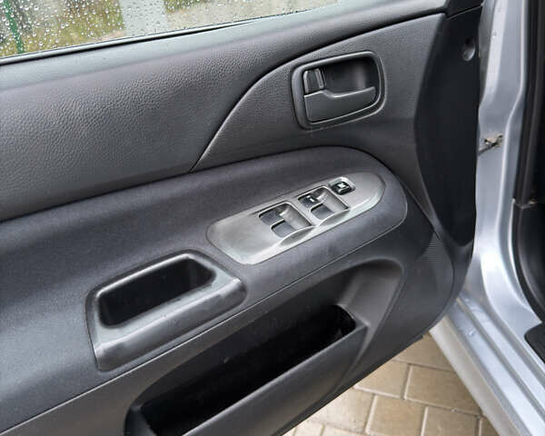Міцубісі Lancer 2006 у Житомирі на Automoto.ua Сірий Міцубісі Lancer, об'ємом двигуна 1.58 л та пробігом 195 тис. км за 4999 $, фото 15 на Automoto.ua