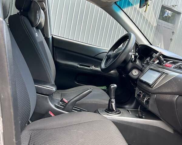 Сірий Міцубісі Lancer, об'ємом двигуна 1.58 л та пробігом 160 тис. км за 4600 $, фото 2 на Automoto.ua