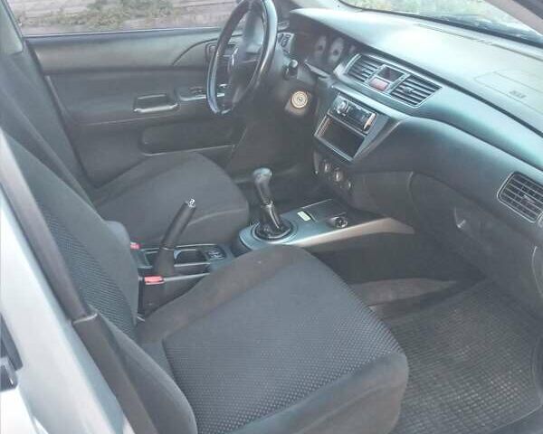 Мицубиси Лансер 2006 в Каменское - Днепродзержинск на Automoto.ua Серый Мицубиси Лансер, объемом двигателя 1.58 л и пробегом 238 тыс. км за 5400 $, фото 3 на Automoto.ua