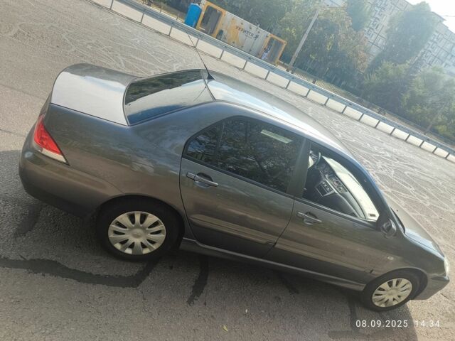 Сірий Міцубісі Lancer, об'ємом двигуна 1.6 л та пробігом 240 тис. км за 4400 $, фото 1 на Automoto.ua