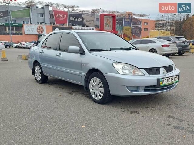 Мицубиси Лансер 2006 в Киеве на Automoto.ua Серый Мицубиси Лансер, объемом двигателя 1.6 л и пробегом 426 тыс. км за 3800 $, фото 5 на Automoto.ua