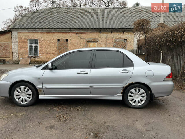 Сірий Міцубісі Lancer, об'ємом двигуна 1.58 л та пробігом 308 тис. км за 3700 $, фото 3 на Automoto.ua