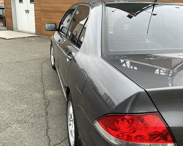 Сірий Міцубісі Lancer, об'ємом двигуна 1.6 л та пробігом 260 тис. км за 4998 $, фото 19 на Automoto.ua