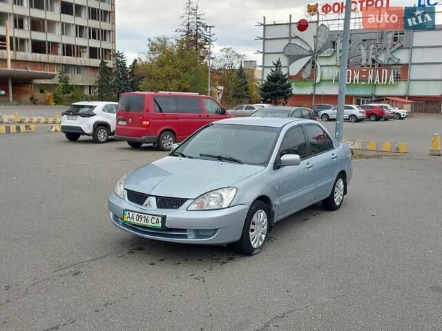Мицубиси Лансер 2006 в Киеве на Automoto.ua Серый Мицубиси Лансер, объемом двигателя 1.6 л и пробегом 426 тыс. км за 3800 $, фото 9 на Automoto.ua