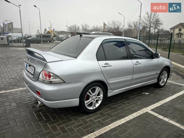 Сірий Міцубісі Lancer, об'ємом двигуна 2 л та пробігом 187 тис. км за 4500 $, фото 11 на Automoto.ua