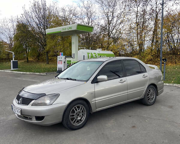 Мицубиси Лансер 2006 в Погребище на Automoto.ua Серый Мицубиси Лансер, объемом двигателя 2 л и пробегом 320 тыс. км за 3300 $, фото 5 на Automoto.ua