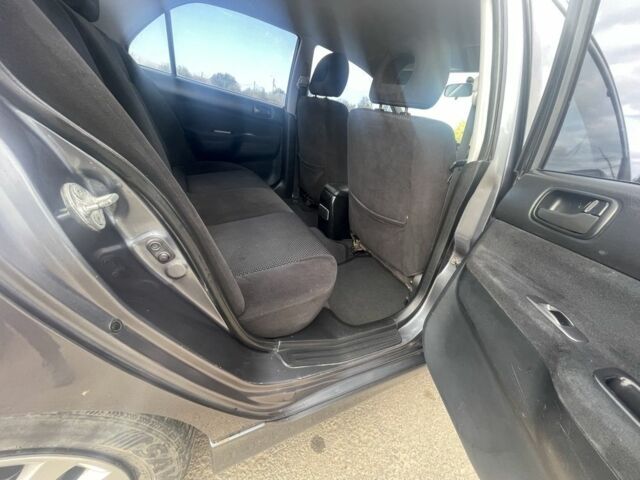 Серый Мицубиси Лансер, объемом двигателя 1.6 л и пробегом 162 тыс. км за 4650 $, фото 7 на Automoto.ua