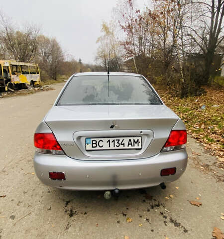 Серый Мицубиси Лансер, объемом двигателя 1.6 л и пробегом 253 тыс. км за 2850 $, фото 11 на Automoto.ua