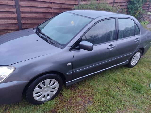Сірий Міцубісі Lancer, об'ємом двигуна 1.6 л та пробігом 190 тис. км за 3500 $, фото 4 на Automoto.ua