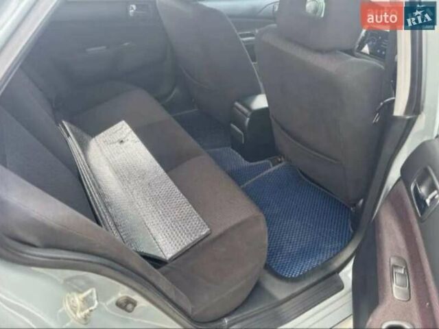 Сірий Міцубісі Lancer, об'ємом двигуна 2 л та пробігом 263 тис. км за 4300 $, фото 7 на Automoto.ua