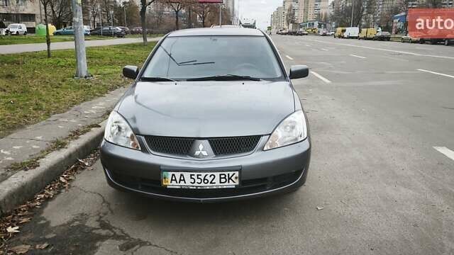 Серый Мицубиси Лансер, объемом двигателя 1.6 л и пробегом 263 тыс. км за 3650 $, фото 8 на Automoto.ua