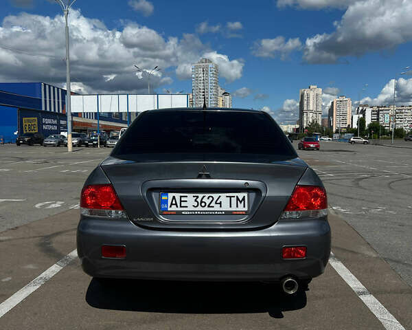 Сірий Міцубісі Lancer, об'ємом двигуна 1.6 л та пробігом 223 тис. км за 4500 $, фото 2 на Automoto.ua