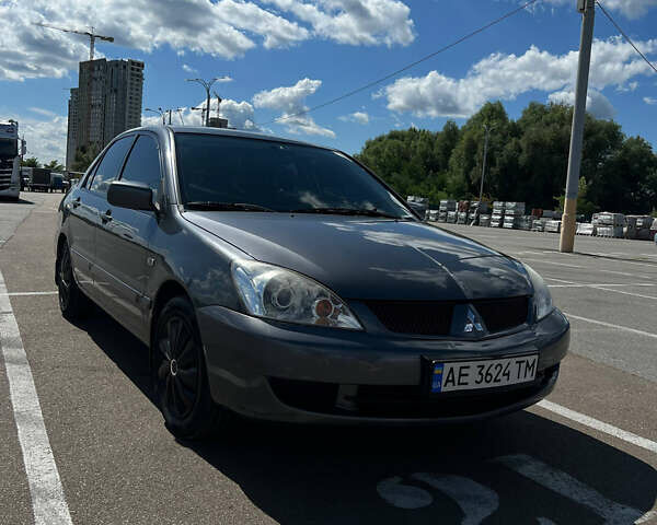 Сірий Міцубісі Lancer, об'ємом двигуна 1.6 л та пробігом 223 тис. км за 4500 $, фото 6 на Automoto.ua