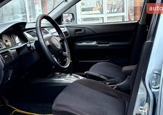 Сірий Міцубісі Lancer, об'ємом двигуна 1.58 л та пробігом 275 тис. км за 4600 $, фото 13 на Automoto.ua