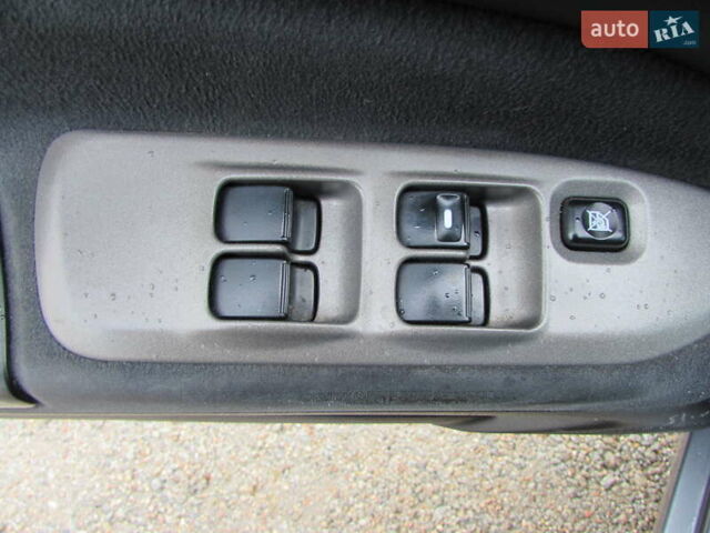 Серый Мицубиси Лансер, объемом двигателя 1.58 л и пробегом 300 тыс. км за 3600 $, фото 19 на Automoto.ua