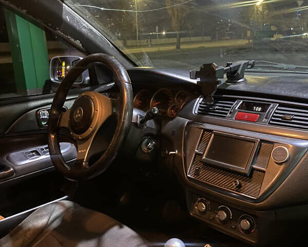 Сірий Міцубісі Lancer, об'ємом двигуна 2 л та пробігом 255 тис. км за 3500 $, фото 44 на Automoto.ua